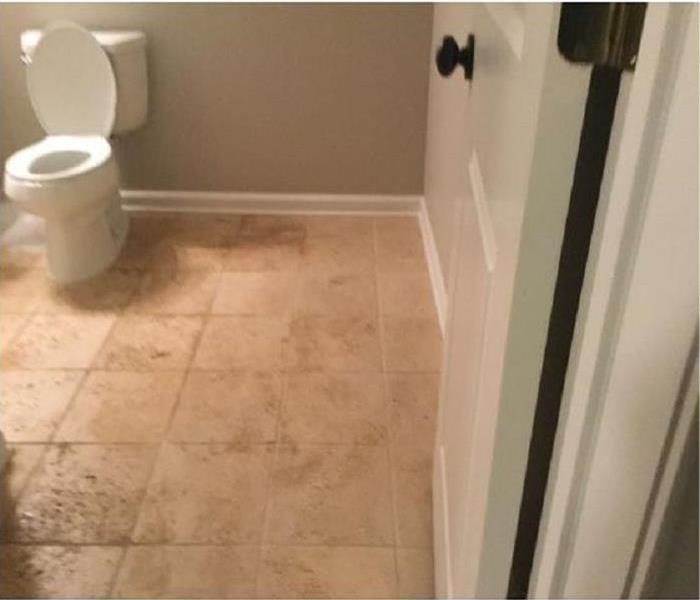 Water Damaged Bathroom Due To Sewage Backup