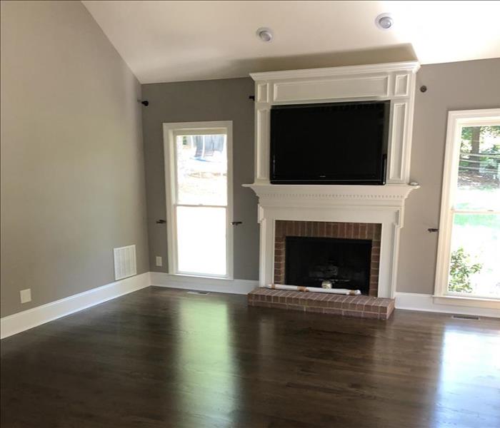 Living room in Atlanta condo that has been fully restored after fire damage