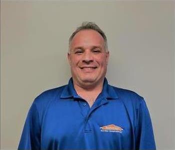 Carl Facchini Construction Manager at SERVPRO of South Atlanta - male employee in front of white wall